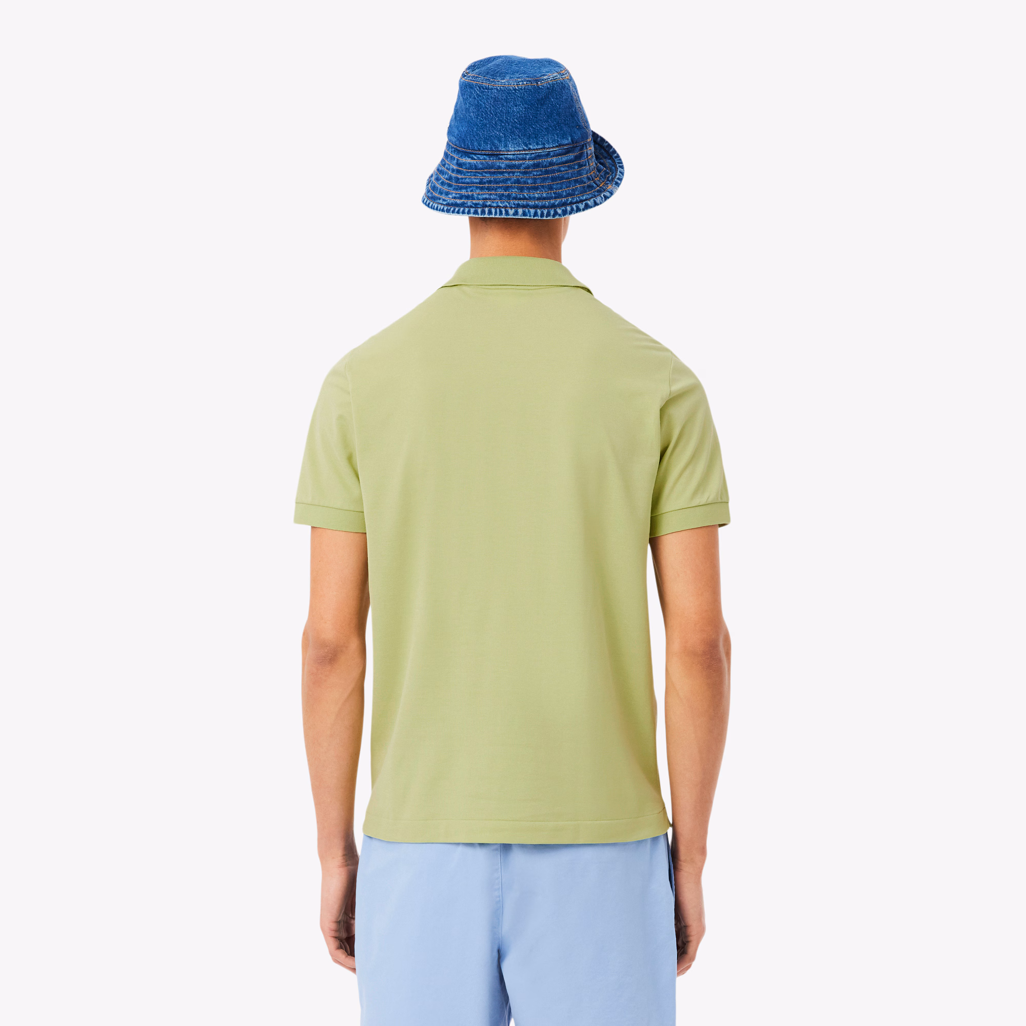 поло polo от бренда lacoste вид слева